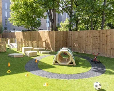 outdoor play area at monkey puzzle day nursery & preschool west kensington